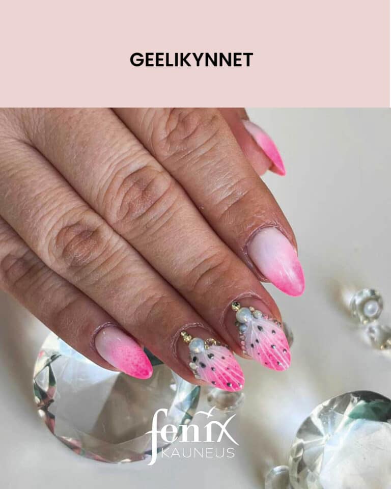 Lyhyet valkoisesta pinkkiin muuttuvat liukuvarjatyt geelikynnet timanttikoristein.