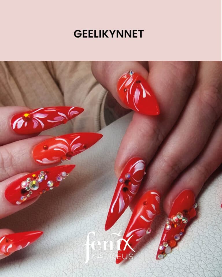 Punaiset geelikynnet valkoisilla maalauksilla ja timanttikoristeilla.