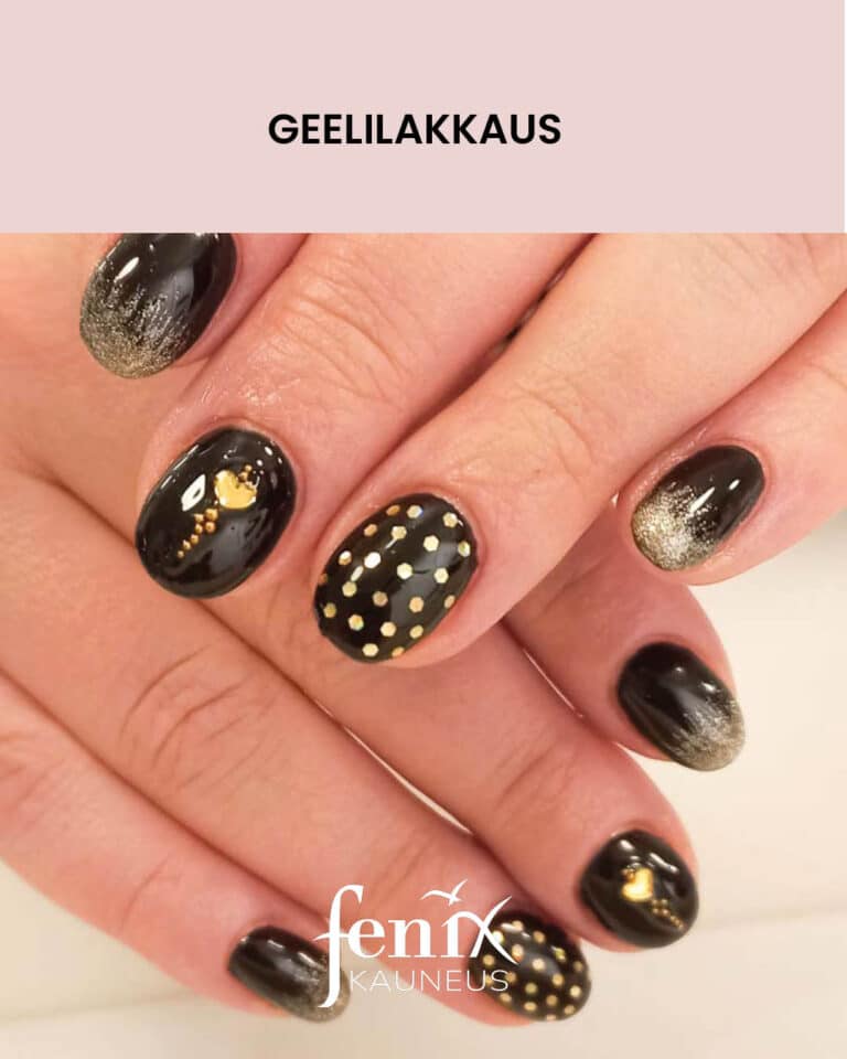 Mustat geelilakatut kynnet kultaisin koristein.