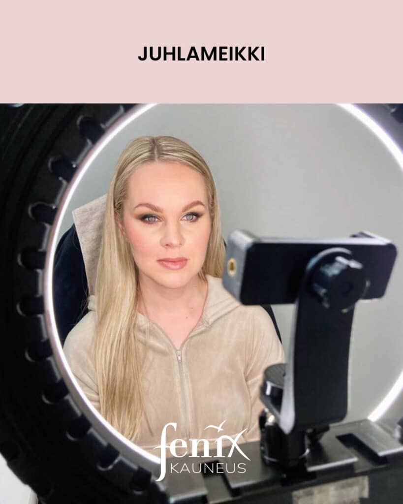 Nuoren naisen juhlameikki ringlightin takaa kuvattuna.