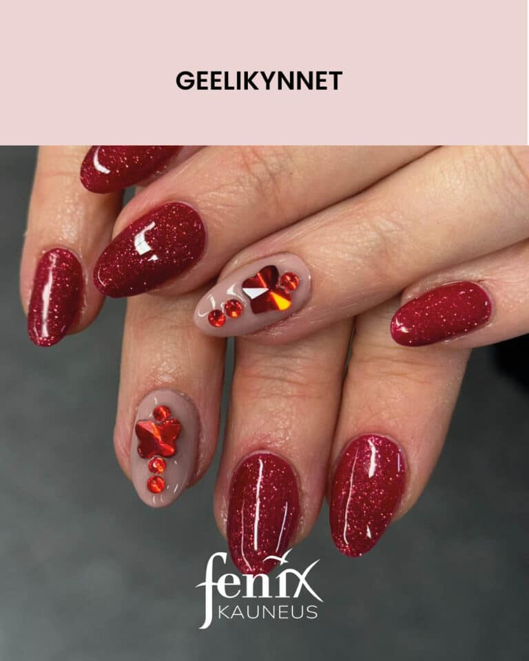 Punaiset glitter geelikynnet, punaisilla timanttikoristeilla.