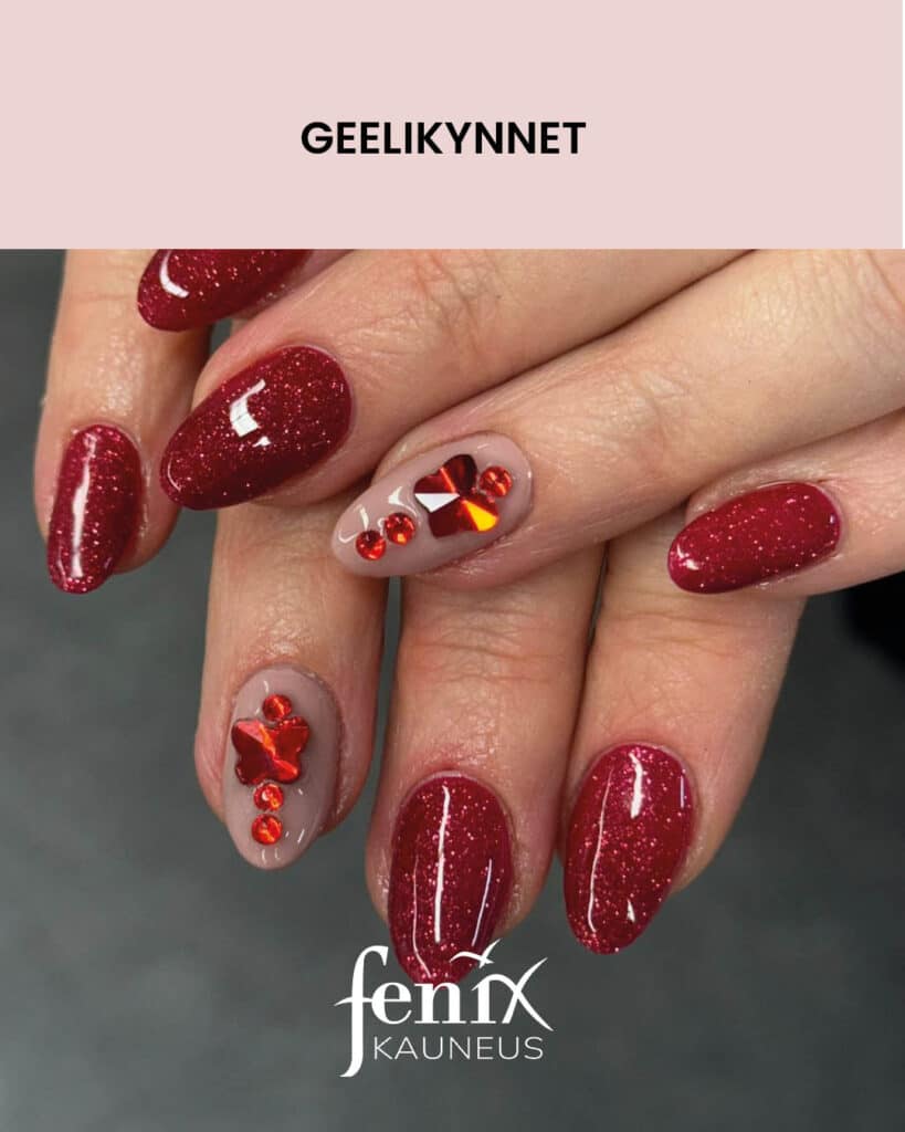 Punaiset glitter geelikynnet, punaisilla timanttikoristeilla.
